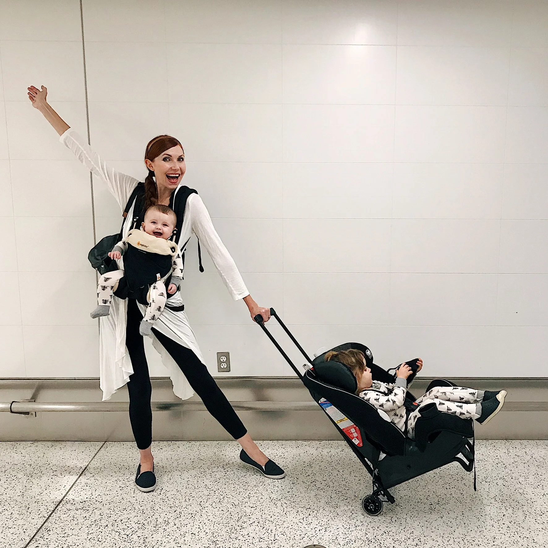 Lean into it: Color coordination and a classic airport backdrop added fun and flair to this airport adventure.