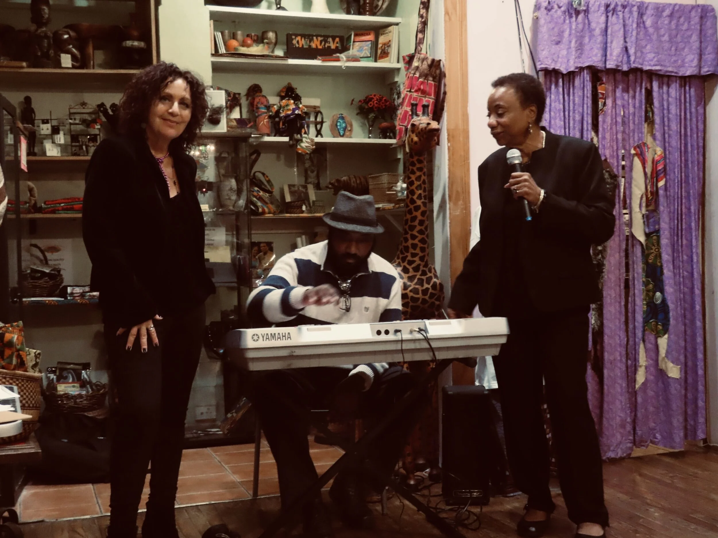Poetry Speaks for Us with music and dancing at Sister's Uptown Bookstore