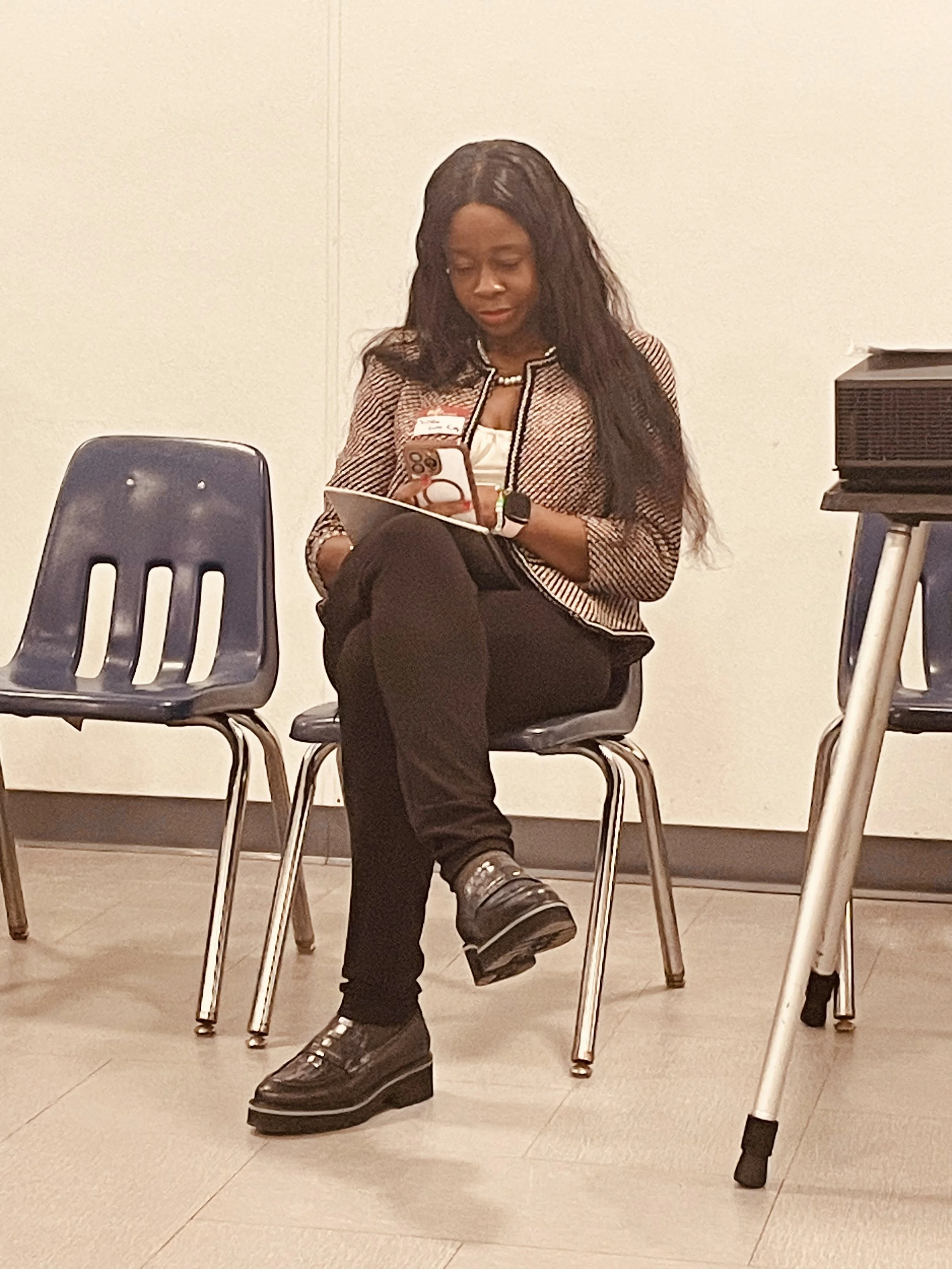 chizzy at AltaG preparing to speak at guest.jpeg