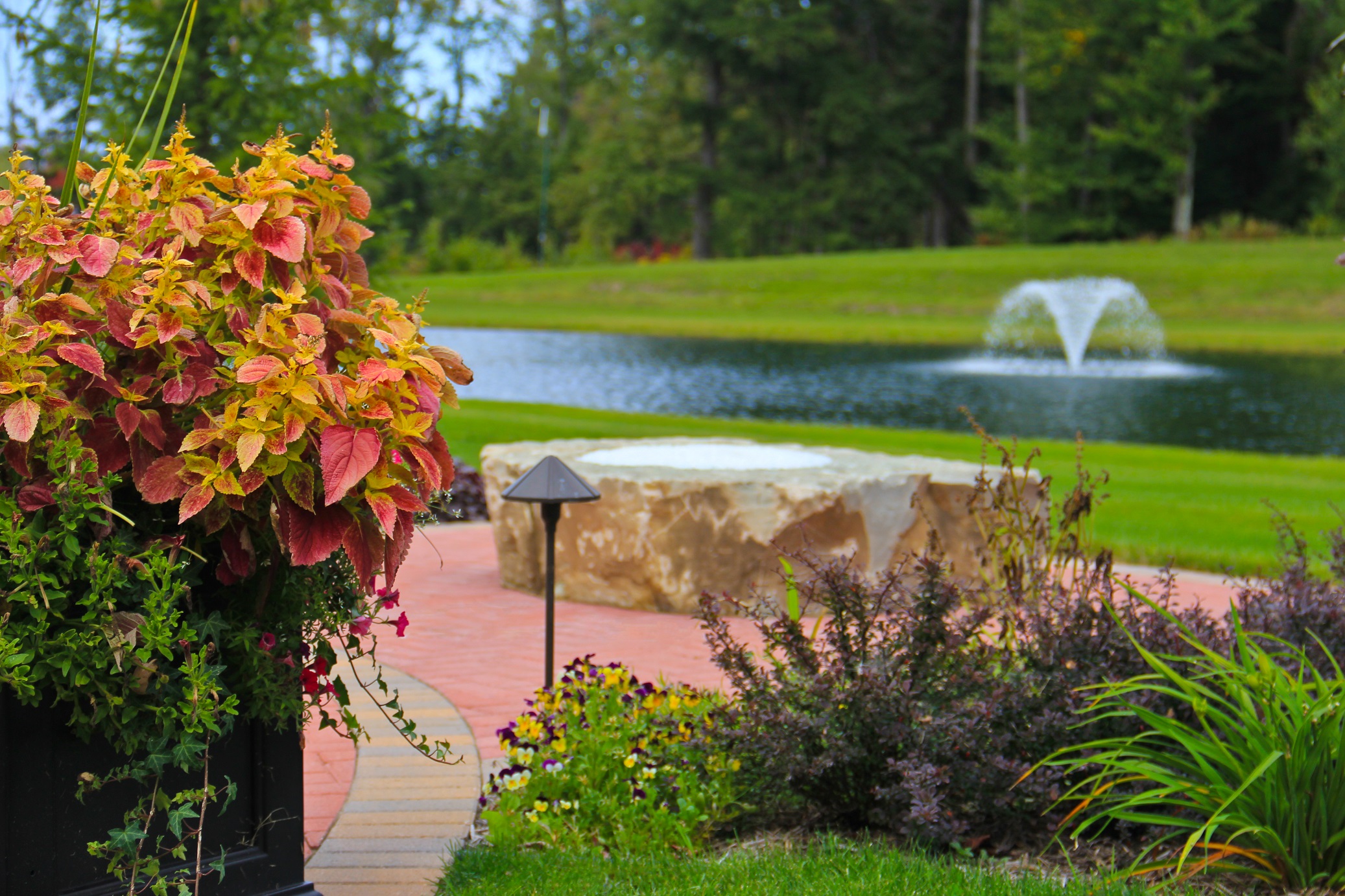 Water features and outdoor fireplace in Birmingham, MI