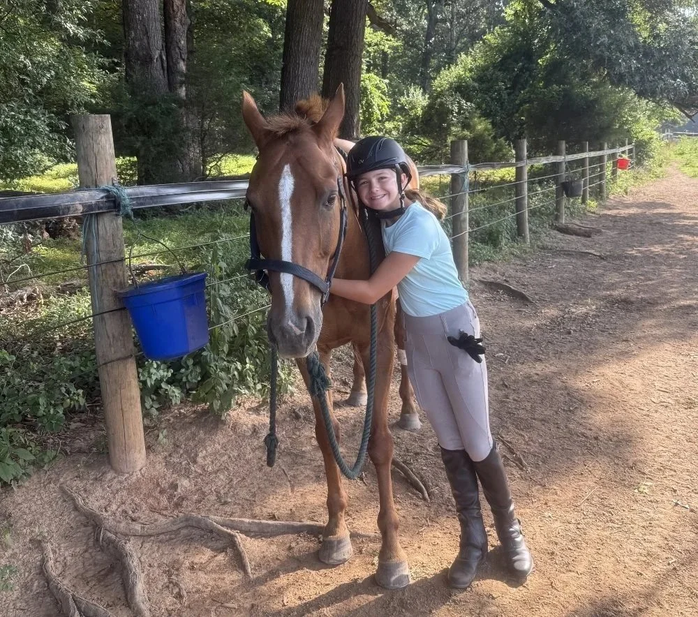 Loving on the polo ponies