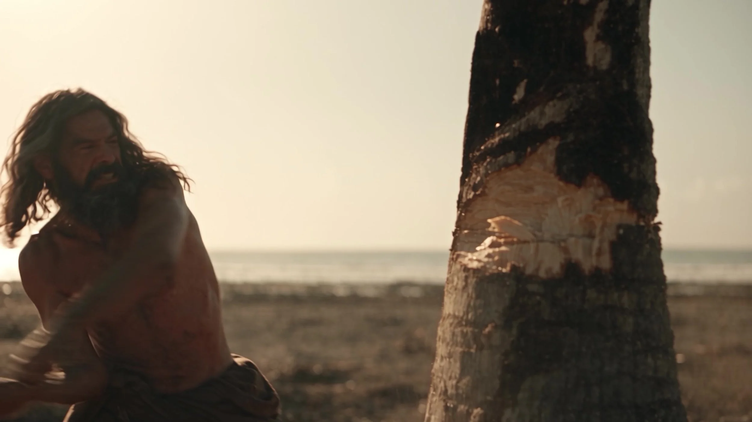 Work-in-progress Scene 1 frame of the old man striking the tree in the island environment