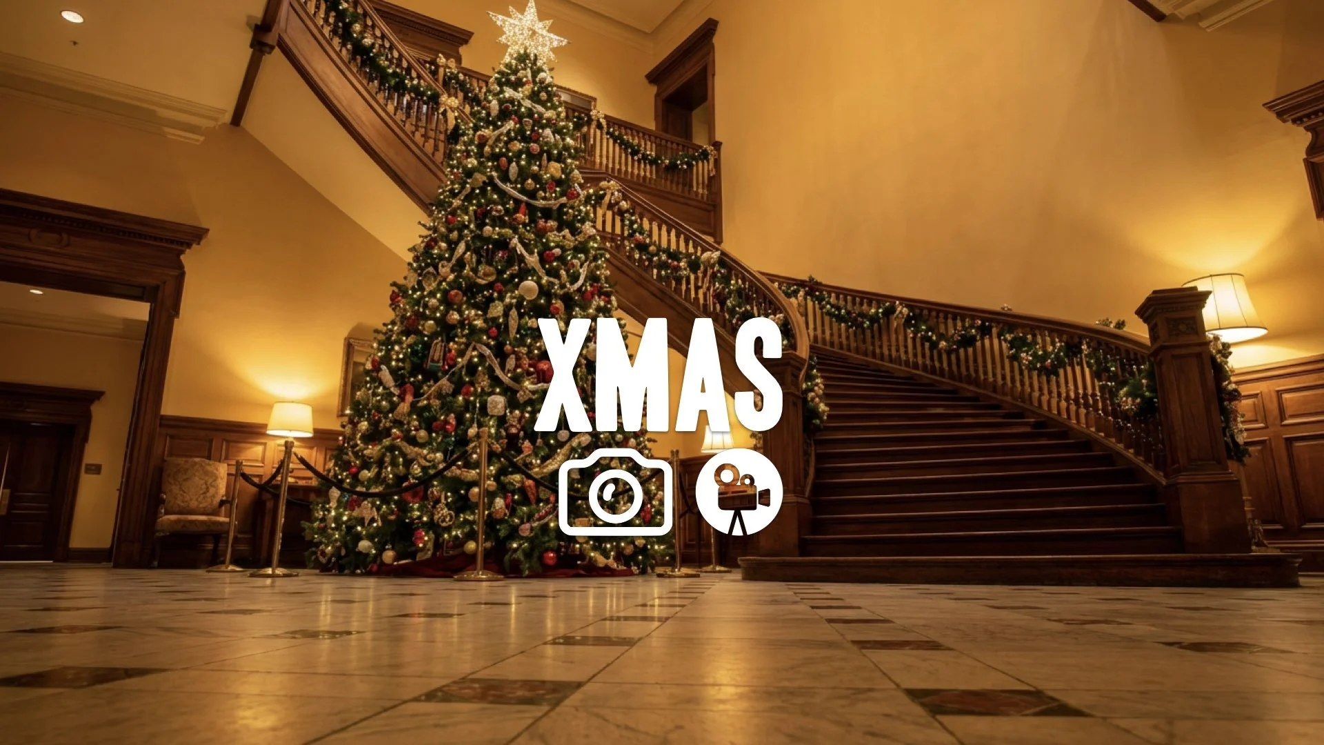 Low-angle POV shot from a tiled floor looking up at a vast, over-decorated Christmas tree and grand staircase. Cozy glow, no music.