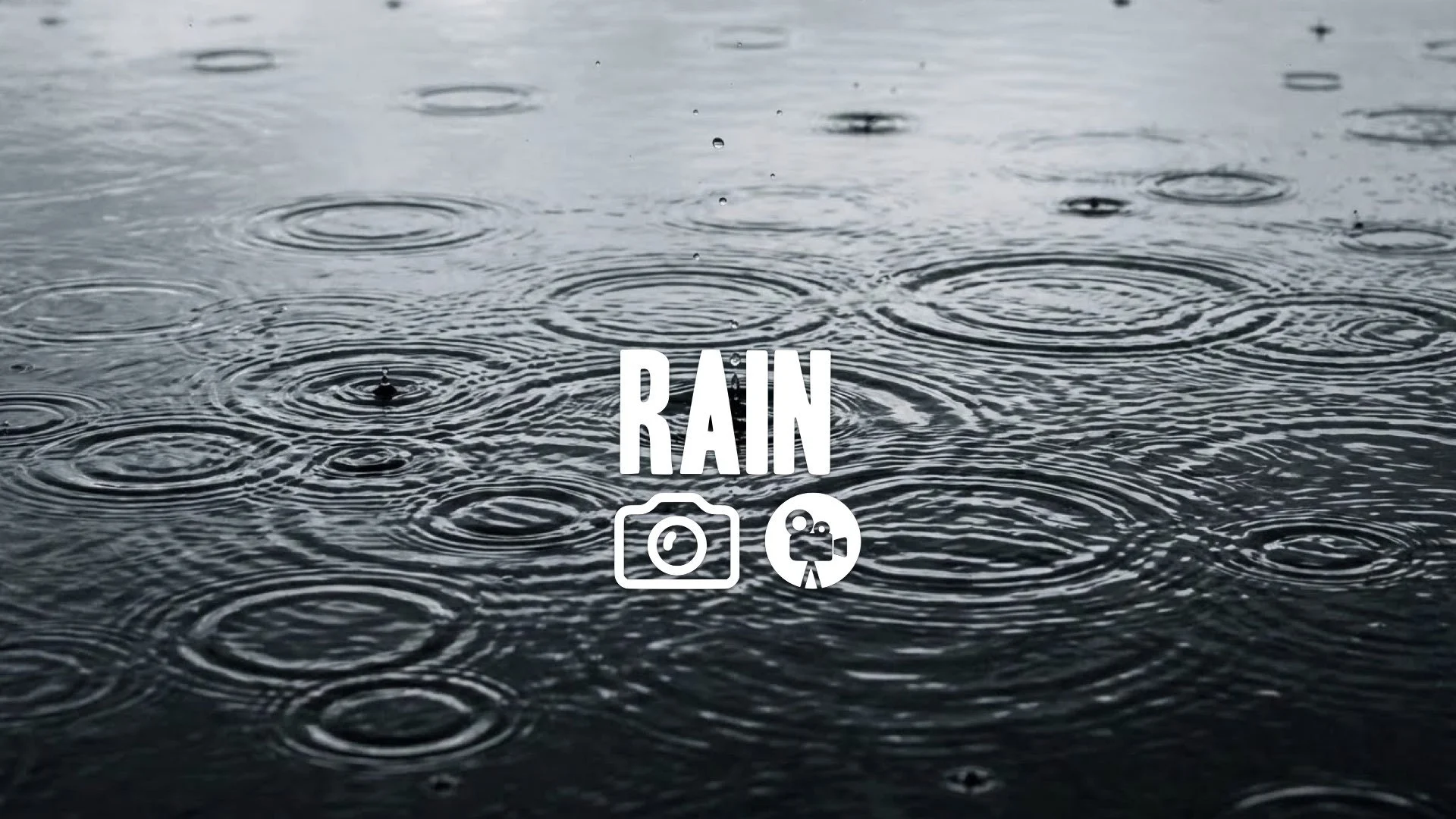 * Raindrops falling on pond ripples expanding circle geometric pattern artistic water texture no music