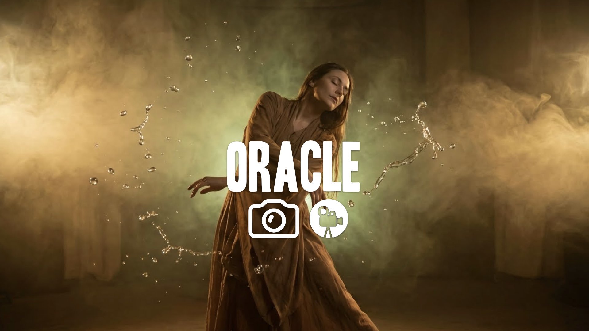 1. Oracle dancing in smoke trance water floating around her slow motion mystical gold green lighting no music