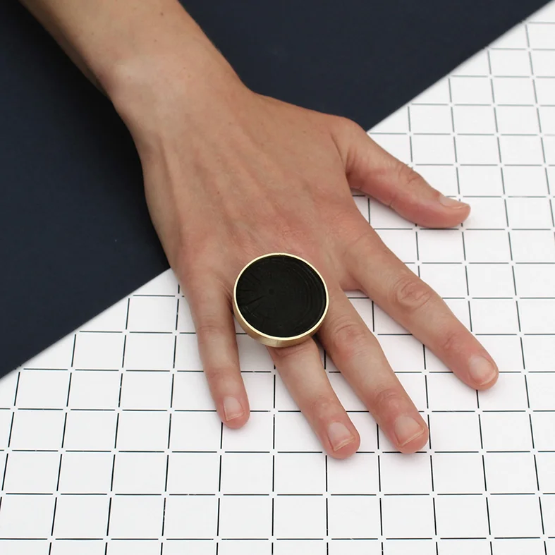 MEDIUM CIRCLE RING WITH SCORCHED WOOD INLAY BRASS AND SCORCHED WOOD £195 (ALSO AVAILABLE IN 22 CARAT GOLD PLATED BRASS OR HALLMARKED STERLING SILVER)