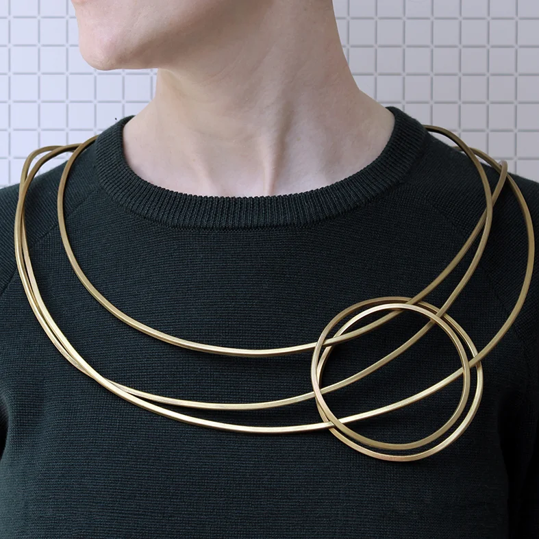 www.poppynorton.com - infinity necklace with interlinking bangle (on model).jpg