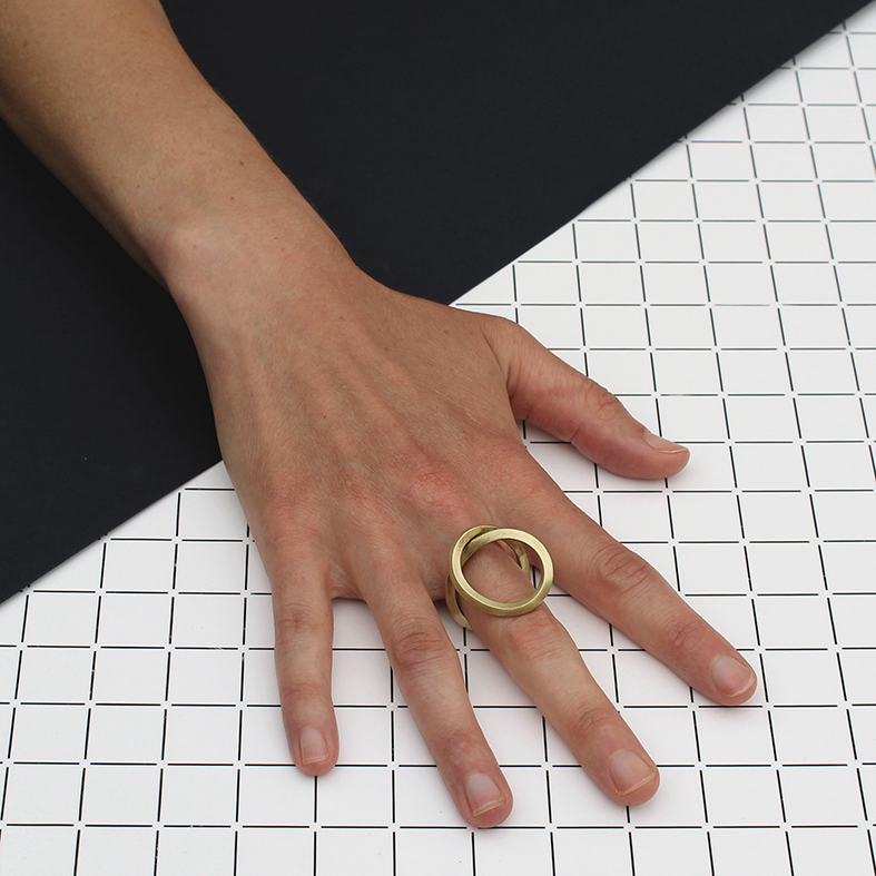 www.poppynorton.com - infinity ring (model wearing it as an upward circle ring).jpg