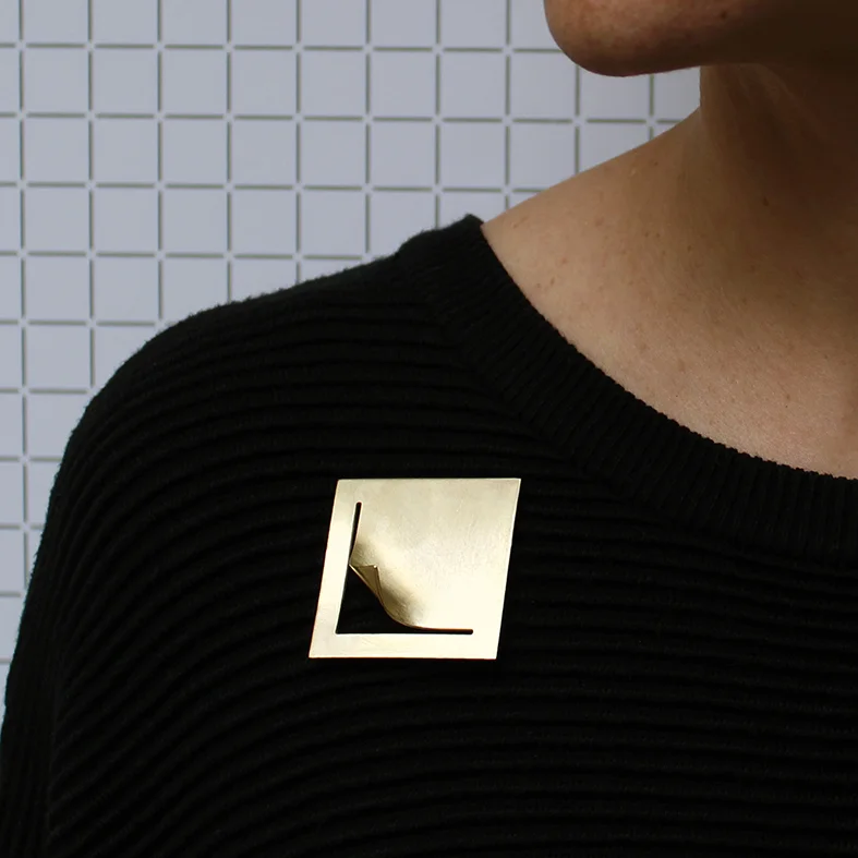 www.poppynorton.com - shapes brooch (square triangle) on model.jpg