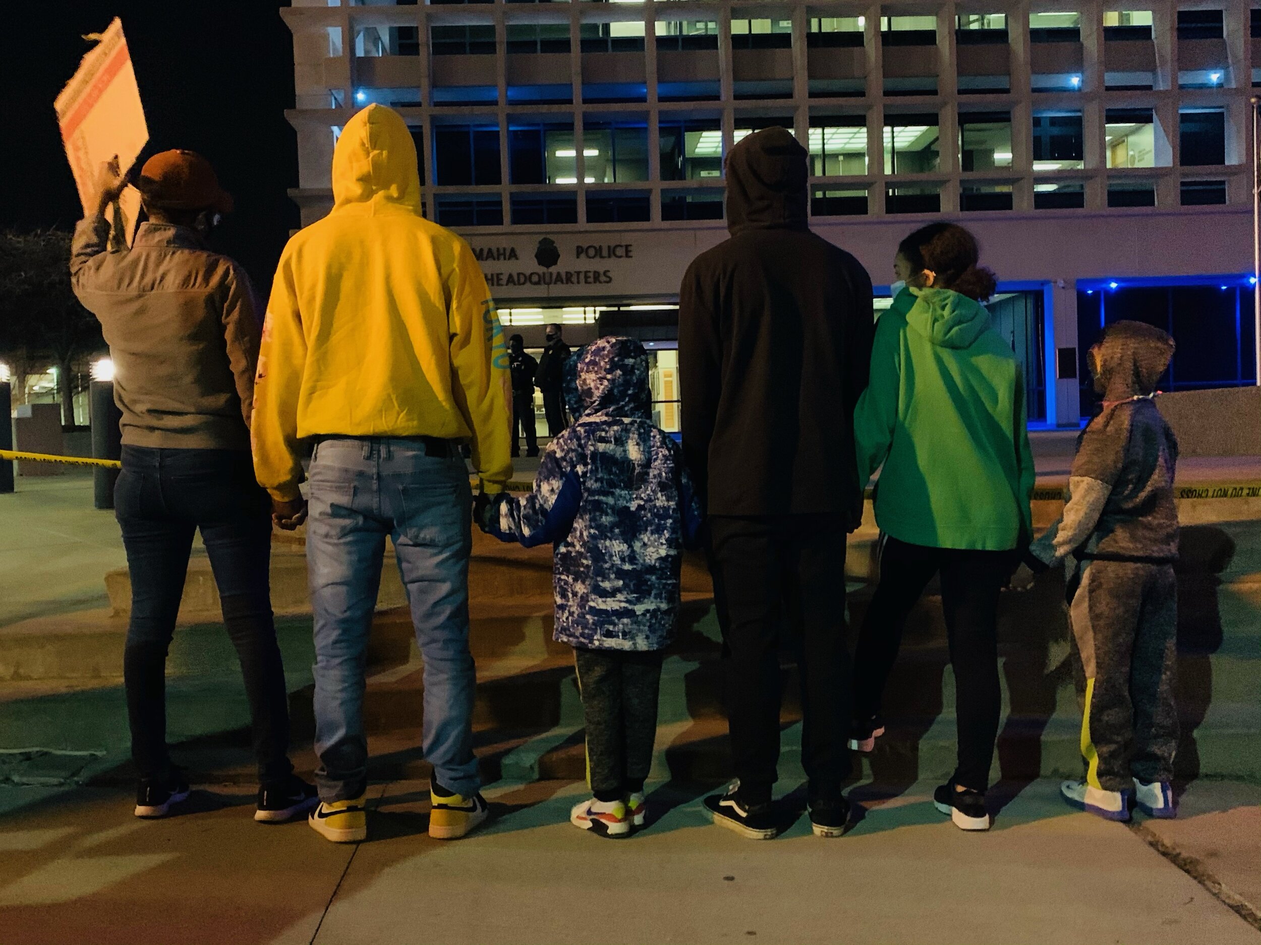 Nyasha brought her five children from Papillion to the demonstration. She told NOISE she prays for her eldest son’s safety everyday when he drives to school.  Image credit: Emily Chen-Newton
