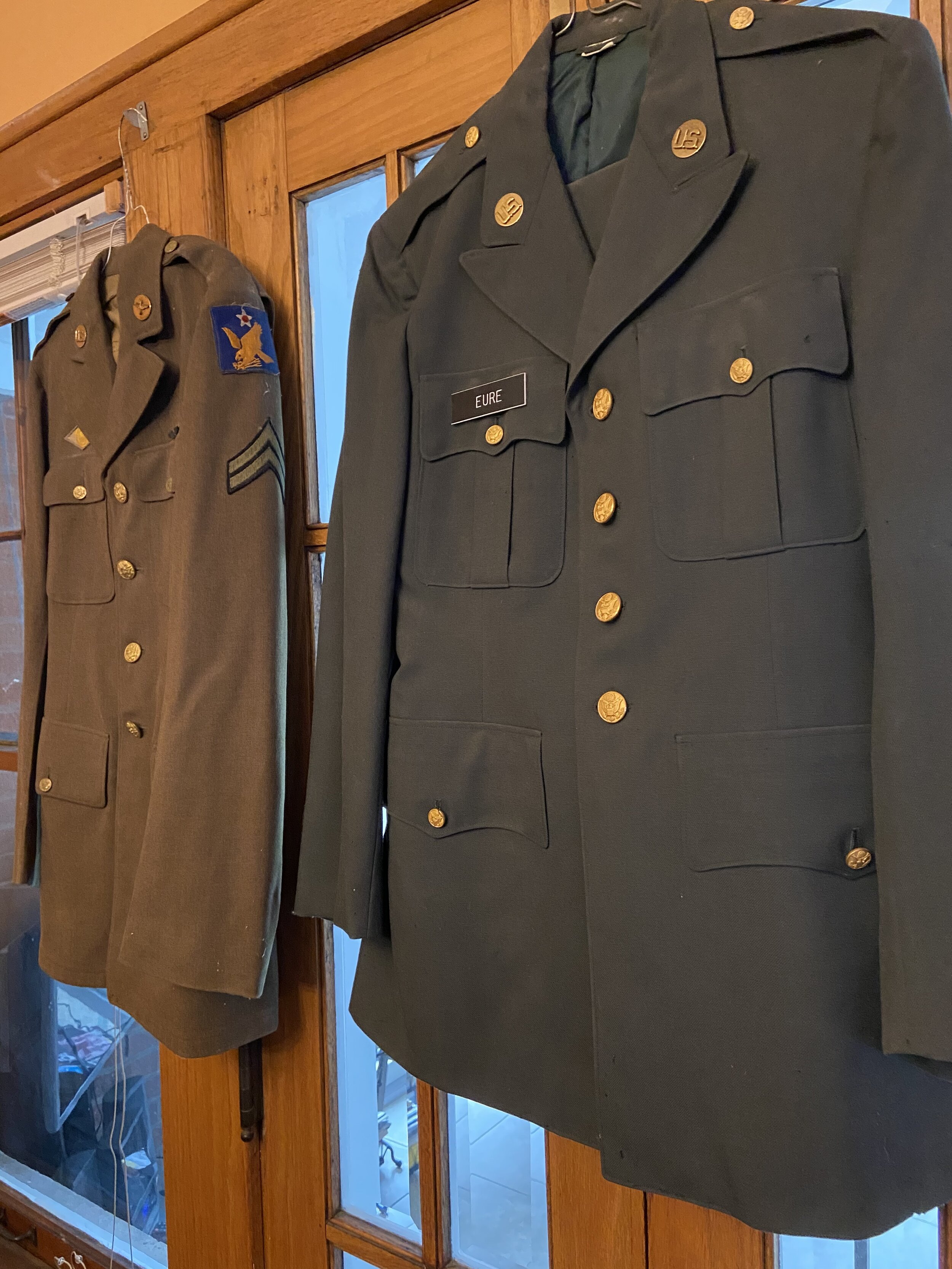The U.S. Army uniforms of Albert Eure and his son Darryl Eure. Phot credit: Eure family