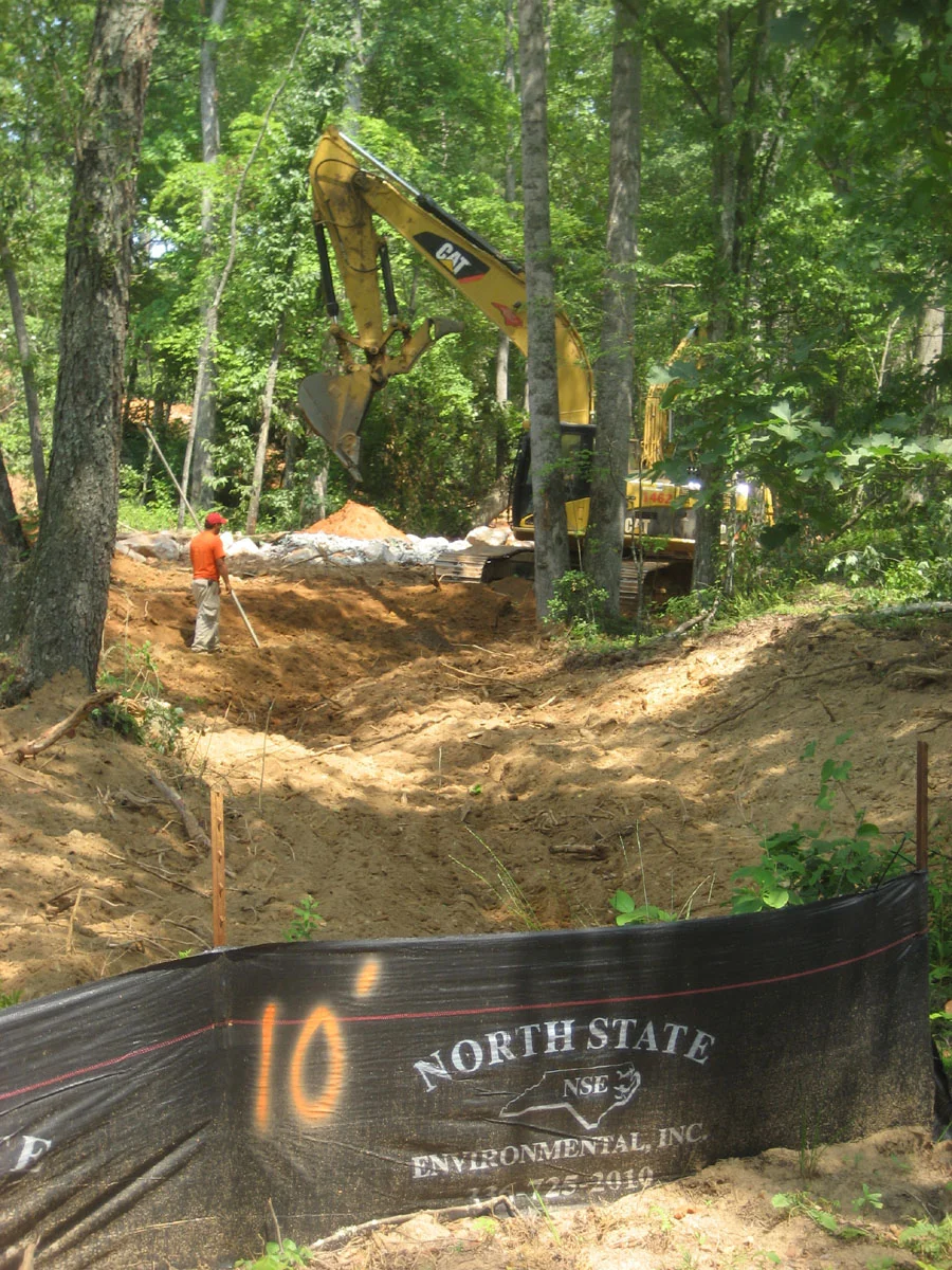 excavator in streambed  - small file.JPG