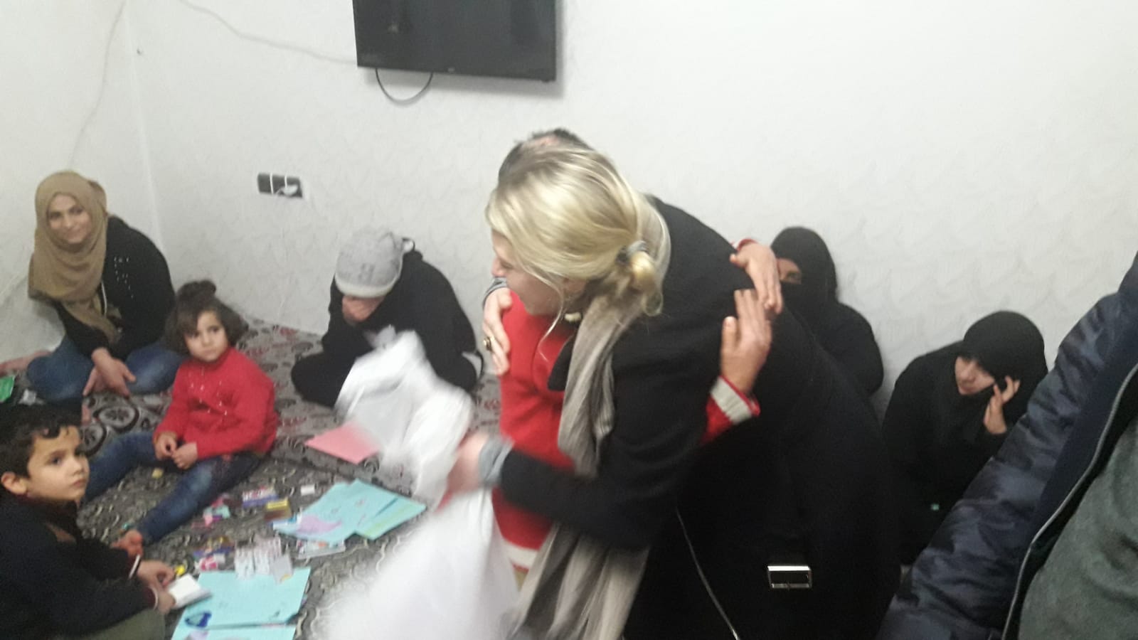 SETF outreach director, Natalie, receives a hug from Fatima at the Rehab Center in Turkey. Fatima and her sister, Diana, were severely burned after their internally displaced camp was bombed by the Assad Regime. They have been at the Center for at least two years and we have become close to these angels.
