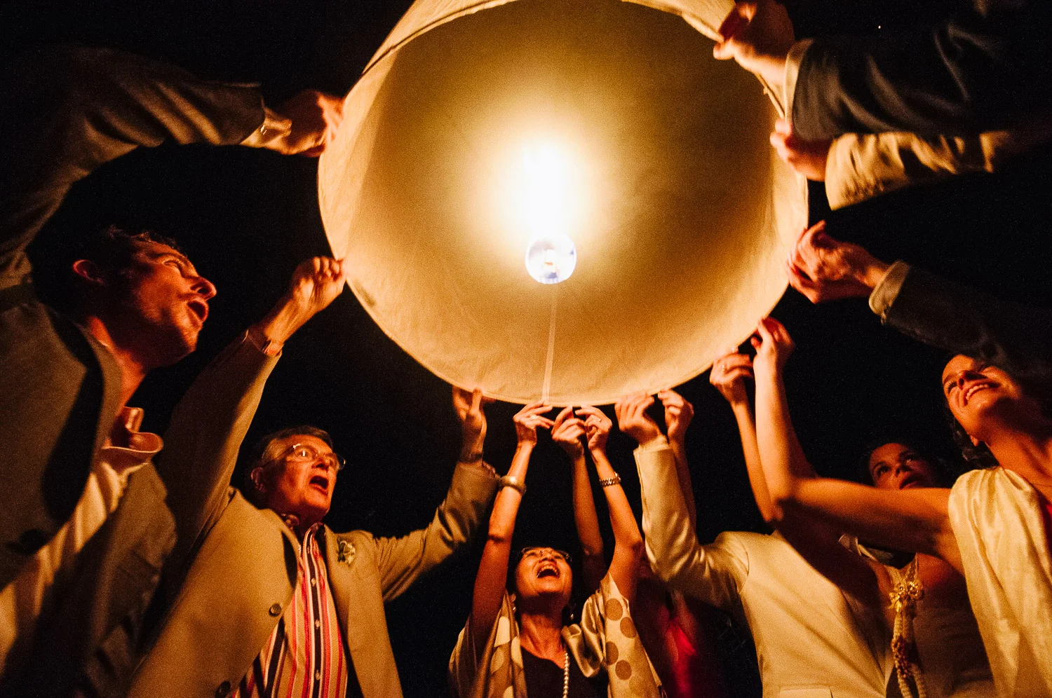 Four Seasons Resort Chiang Mai Wedding, wedding guests releasing lanterns.