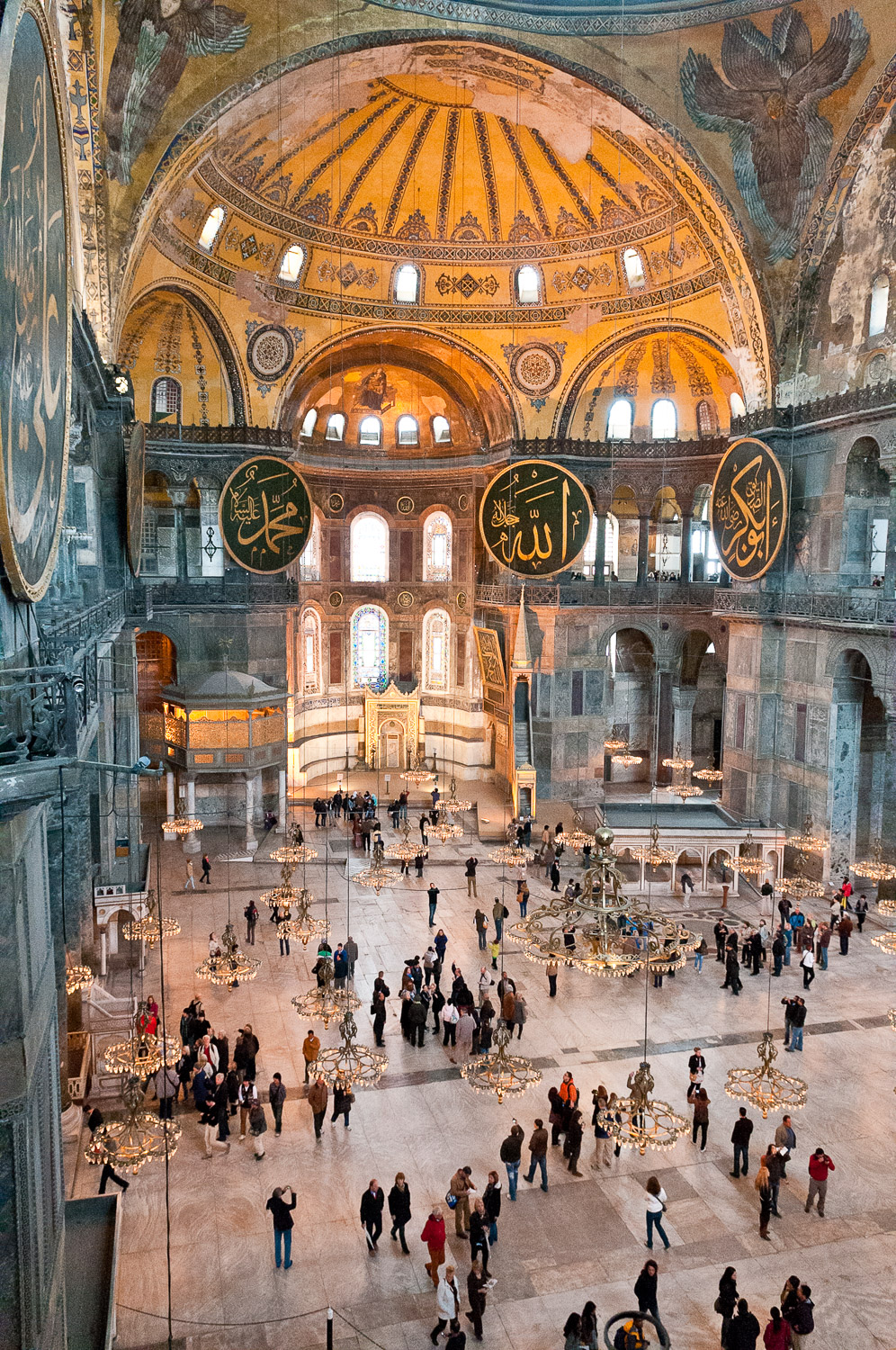 Tourists inside the Aya Sofya Mednani, Istanbul, Turkey, on the 1 April 2012. Aya Sofya Mednani is called Sancta Sophia in Latin, Haghia Sofia in Greek and the Church of the Divine Wisdom in English and is one of Istanbul's most famous landmarks.