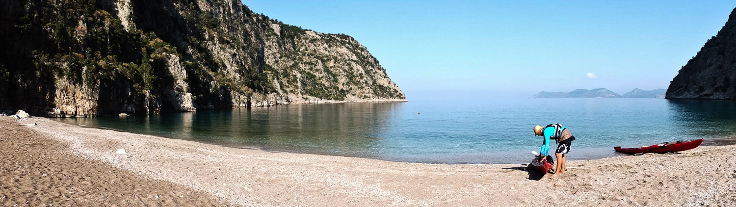 Man unloading his kayak, Turquoise Coast, Turkey.
