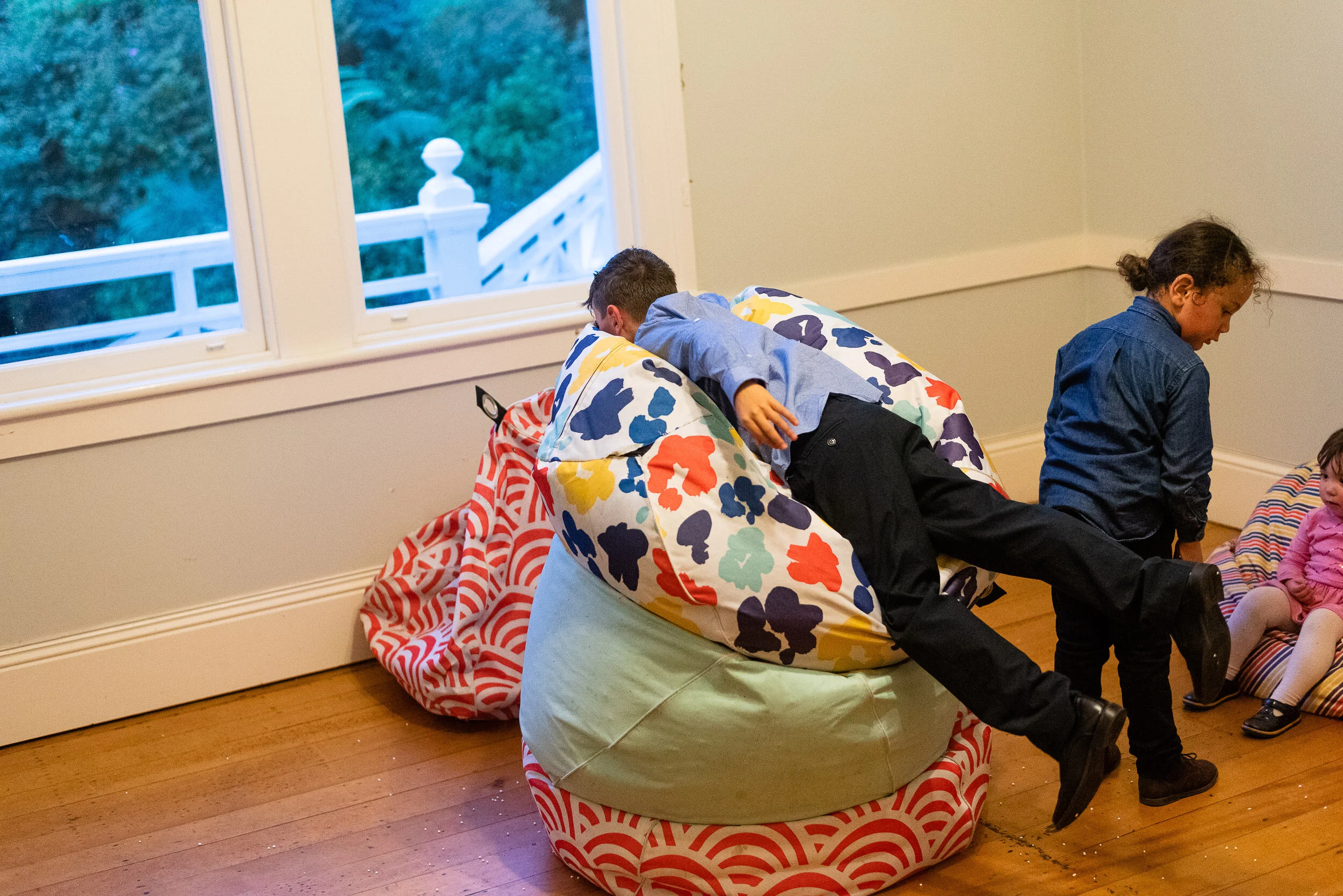 Kids playing at a Gear Homestead wedding.