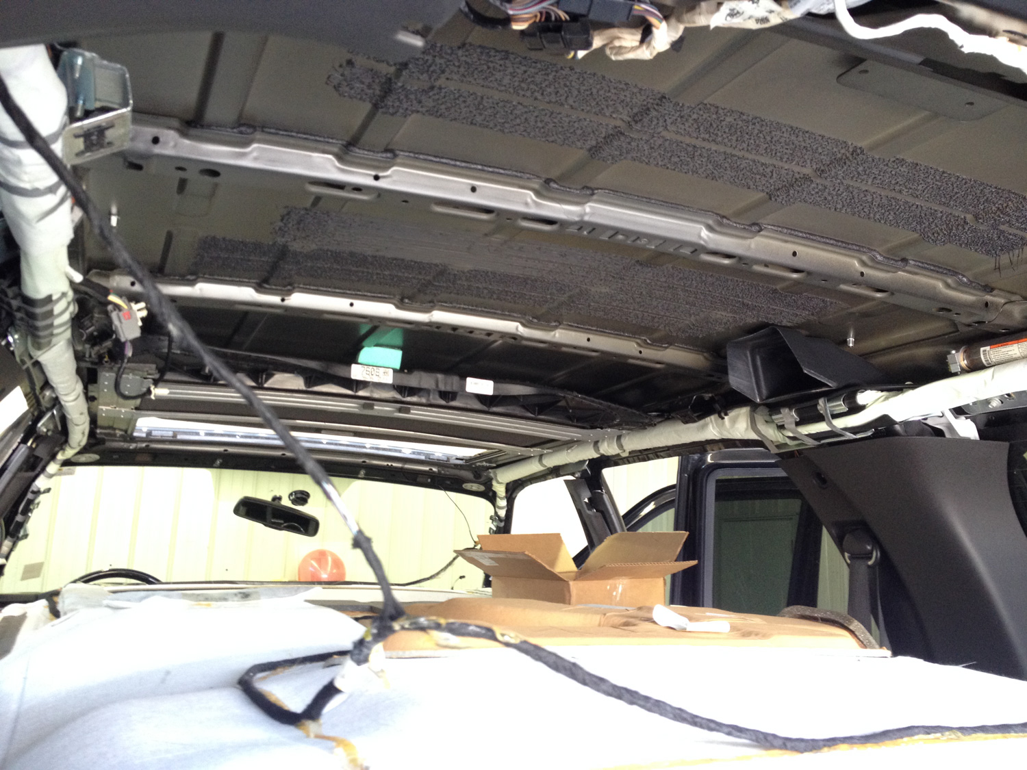 Car headliner removed to repair sunroof