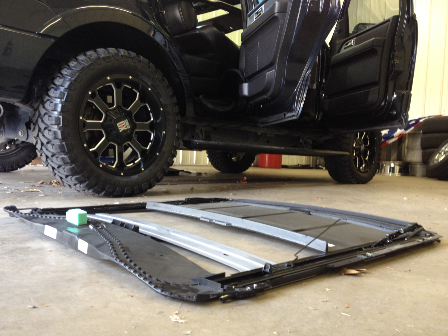 Power sunroof assembly removed from Ford F-150 truck