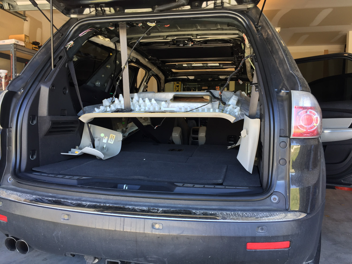 Chevy SUV with headliner and interior trim removed
