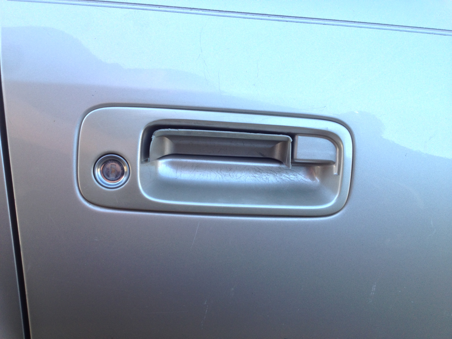 Broken off door handle on exterior of car door