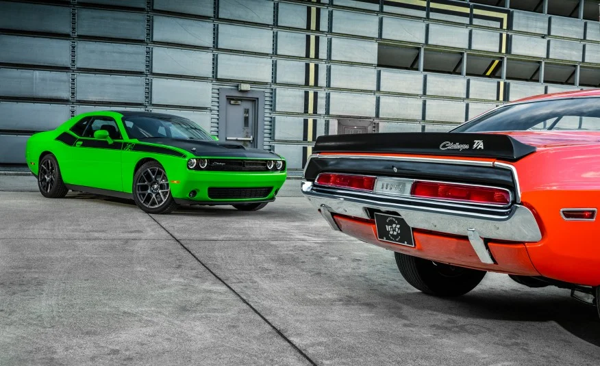 2017 T/A in “Go-Green”, alongside an Orange 1970 T/A