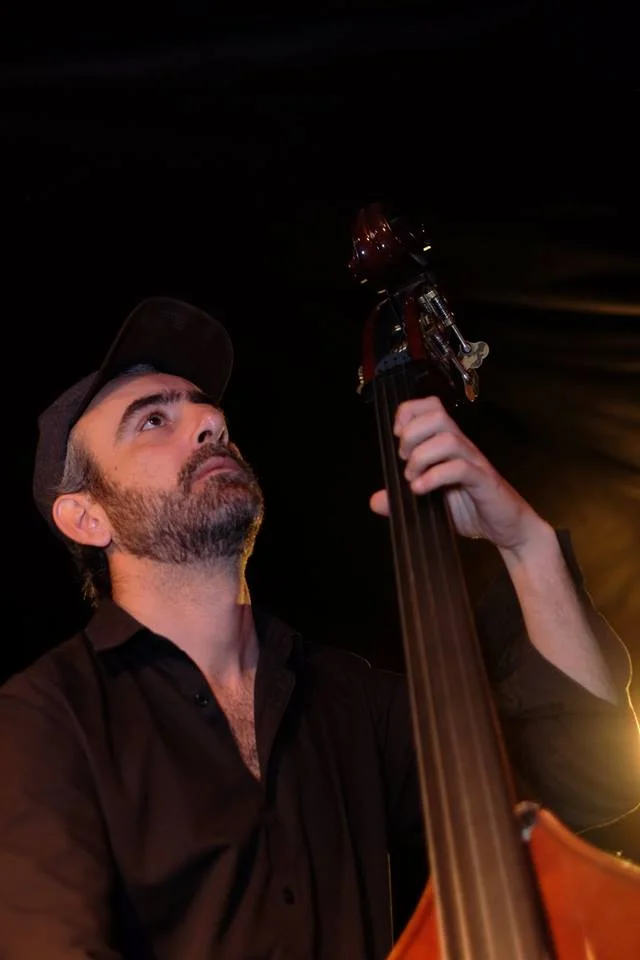 APOSTOLOS SIDERIS (professional musician, composer, educator) Apostolos Sideris was born in Athens, Greece, where he had his first musical training, playing the classical flute. By the time he was 15 he had switched to the electric bass. It didn't take long for him to fall in love with the instrument ,and he was soon playing with various rock bands around Athens. By the time he was 17, his focus was directed towards Jazz music and attended the Berklee College of Music. During his time at Berklee, he picked up the upright bass and since then it has been his main instrument. Following his stint in Boston, Apostolos moved to New York and earned his Master's degree in Performance, while being instructed by bass virtuoso, John Patitucci. Since then he has been freelancing around the States as well as abroad. He has performed with a wide array of musicians ranging from jazz masters such as drummer Clarence Penn, guitarists Lionel Loueke and Rez Abbasi and pianist Leo Genovese, to world music sensations such as composer and oudist Ara Dinkjian, Greek ECM recording artist Savina Yannatou, Syrian vocal master Youssef Khasab and Lebanese composer Ziad Rahbani. Sideris is also a devoted composer, writing in many different styles, ranging from Jazz to Middle Eastern and Latin influenced music. He currently resides in Istanbul Turkey and co-founded an Ethnic-Jazz group called MESEL. He is now preparing his own album called ‘South’ which will consist of his own compositions and improvisations, based on Greek and Middle Eastern themes .