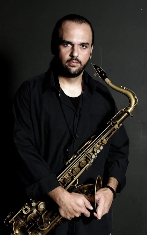 IACOVOS PARPAS (professional saxophonist, educator) Iacovos Parpas studied jazz music at the Berklee College of Music in Boston, MA. His return to Cyprus found him busy in the music industry teaching and performing as a leader or sideman. He started giving lessons of saxophone, clarinet and flute. He's been teaching the music idiom in public Schools for 13 years now and since 2017 he is a member of the faculty of the European University in Cyprus. During his career he's been on stage with many important Greek and Cypriot musicians and participated in CD recordings, theater and TV productions. Parpas was one of the creating members of the Cyprus Big Band. During his 20years offer in the music scene of the island Parpas has participated in many festivals and performed at the most important jazz clubs and main stages of the country.