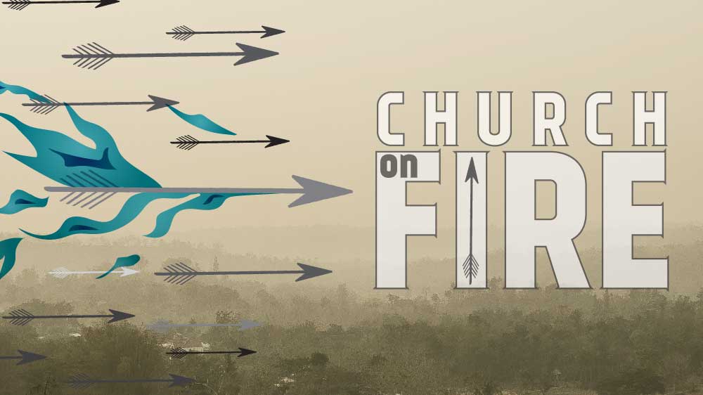 A multitude of arrows flying above a hazy landscape. One of the arrows is engulfed in a blue flame. 'Church on Fire' is written along the side