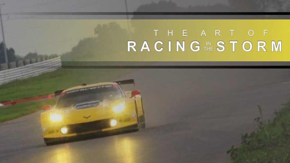 A corvette is racing around a wet racetrack. 'The Art of Racing in the Storm' is written on the top of the image.