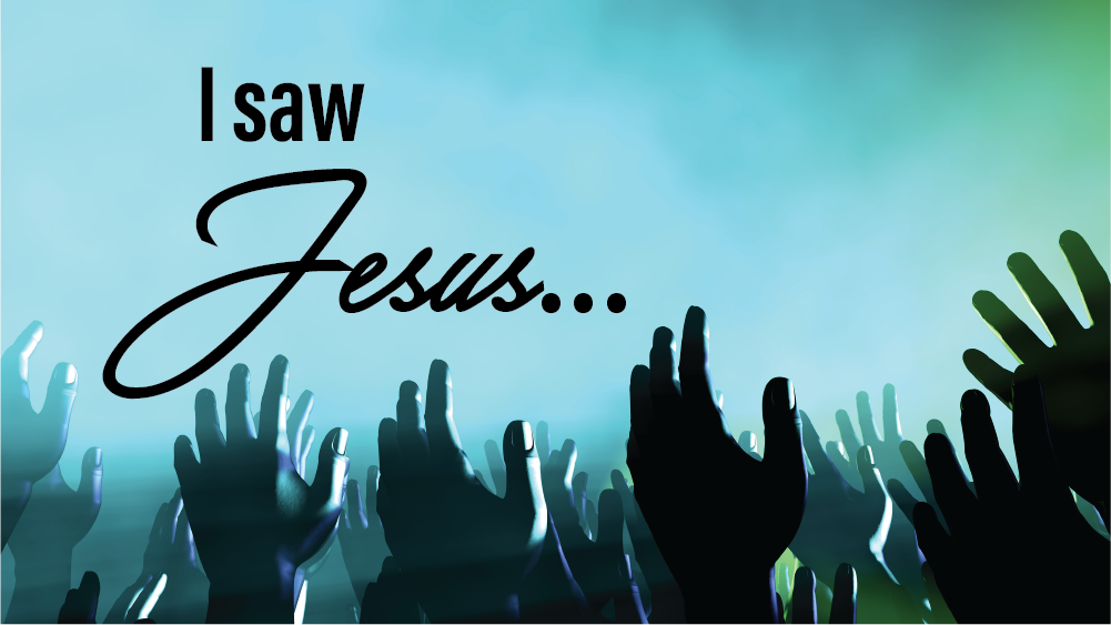 Crowd of people lift their hands in worship. 'I Saw Jesus' is superimposed
