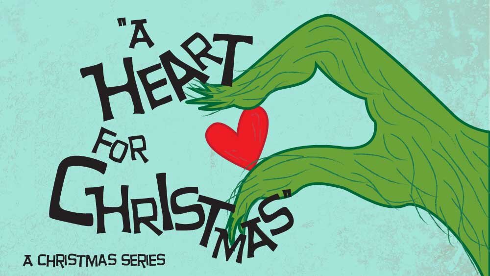 The hand of the Grinch squeezes a tiny heart. "A heart for Christmas: A Christmas Series" is Superimposed