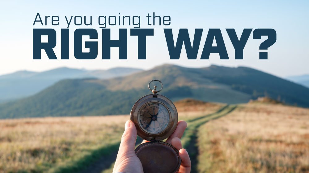 A person stares at a compass as they approach a large mountain range. "Are You Going the Right Way" is superimposed on top