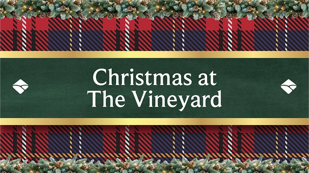 Wrapping paper is spread across. 'Christmas at the Vineyard is superimposed'