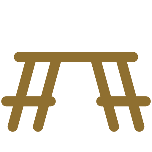 A wooden picnic table with attached benches