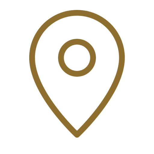 A gold location pin icon on a black background.