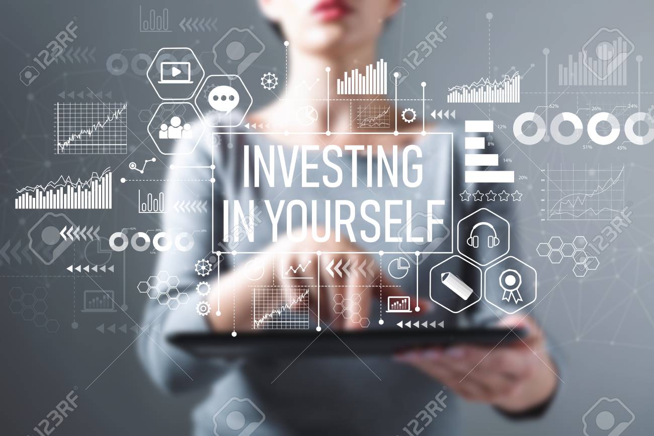 107030817-investing-in-yourself-with-business-woman-using-a-tablet-computer.jpg