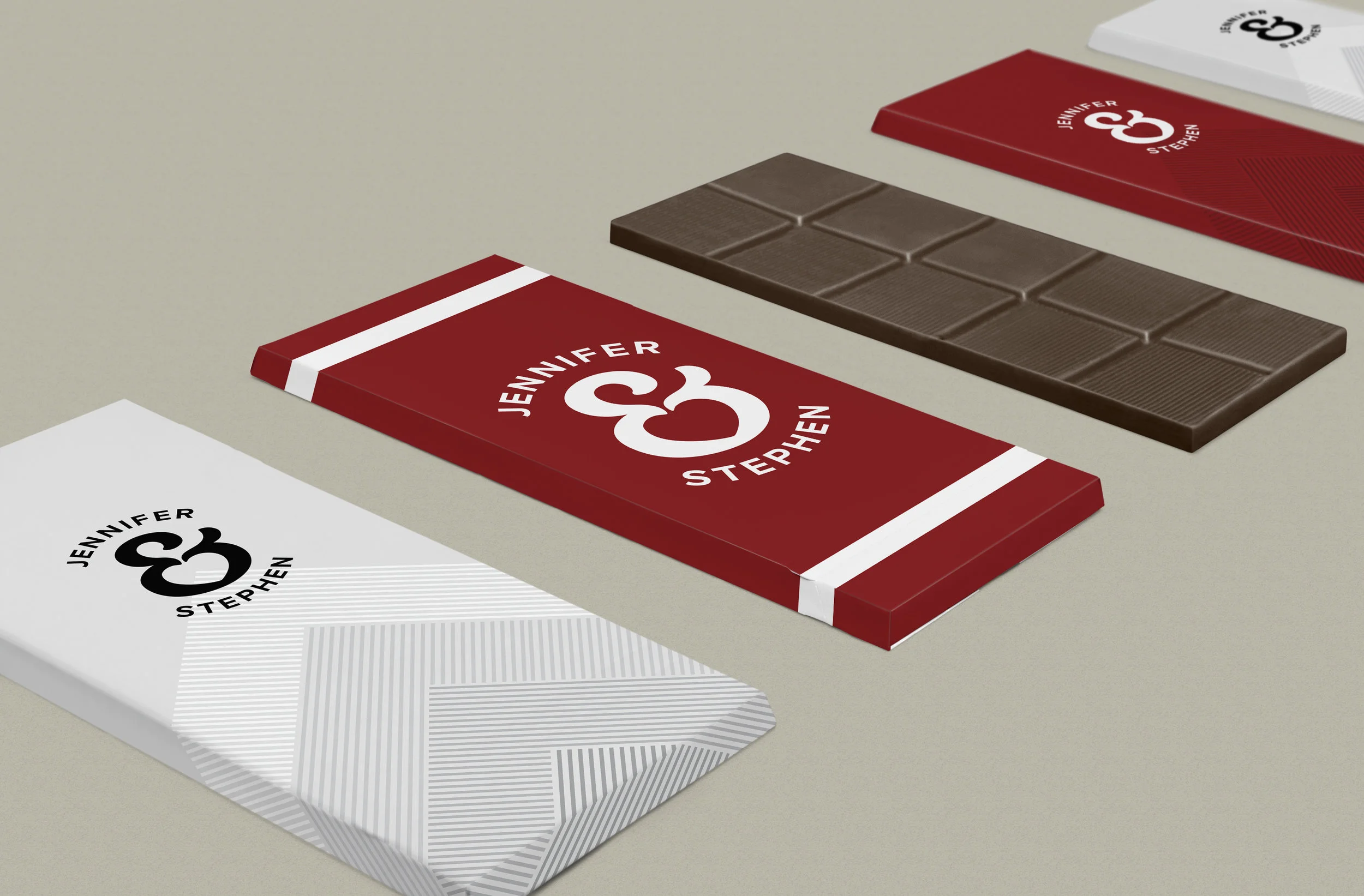  Chocolate bar wrappers designed for a friend’s wedding favor. They wanted a bold design that would pop off black and white tablecloths.  