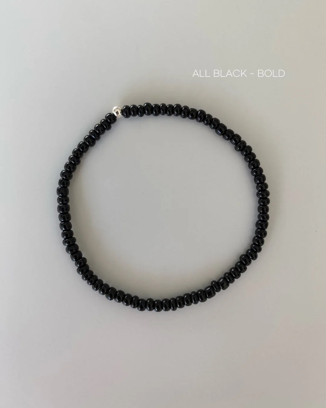 JOYEM All Black Bold Silver Text.JPG