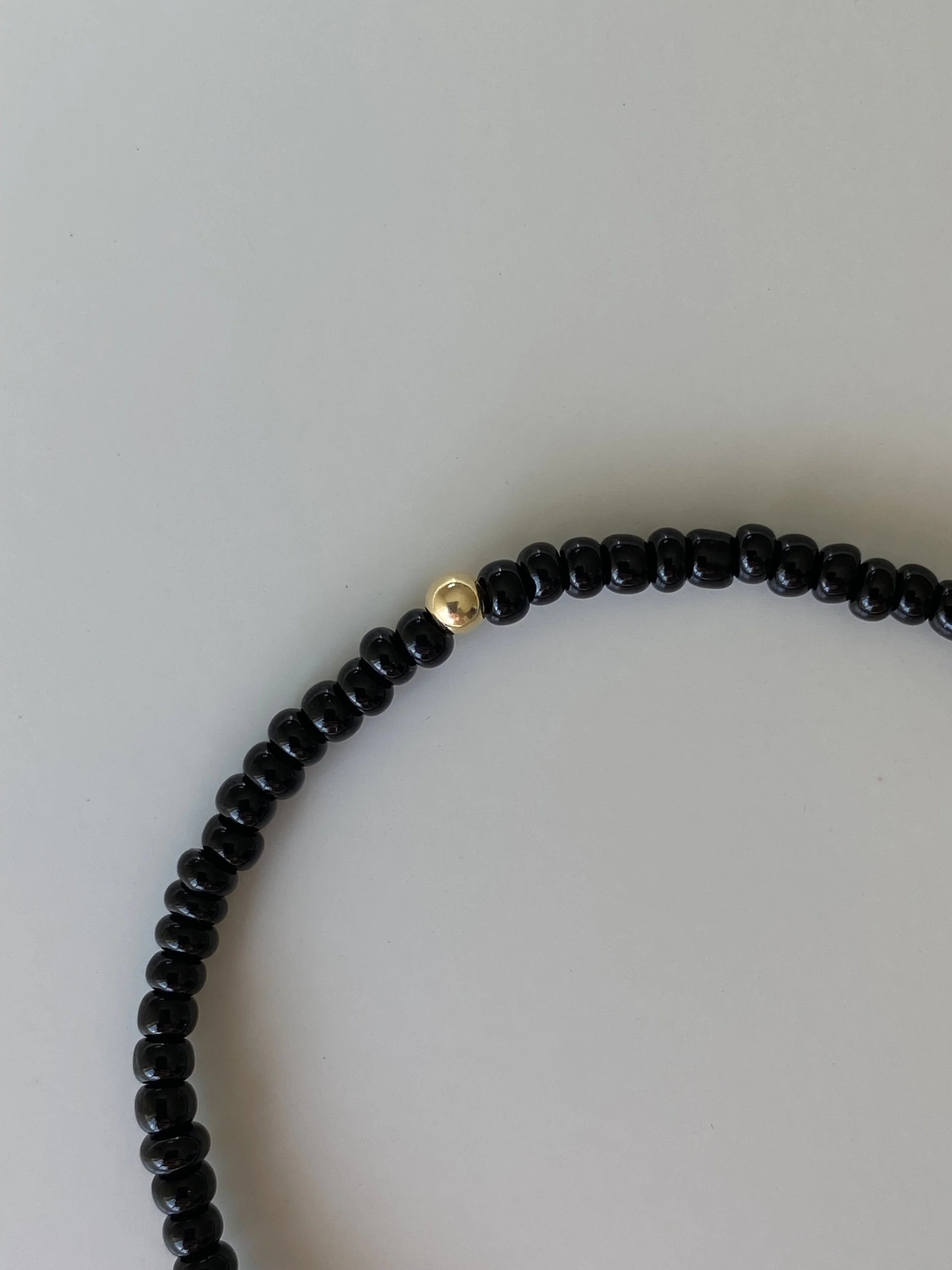 JOYEM All Black Bold Gold Details.jpg
