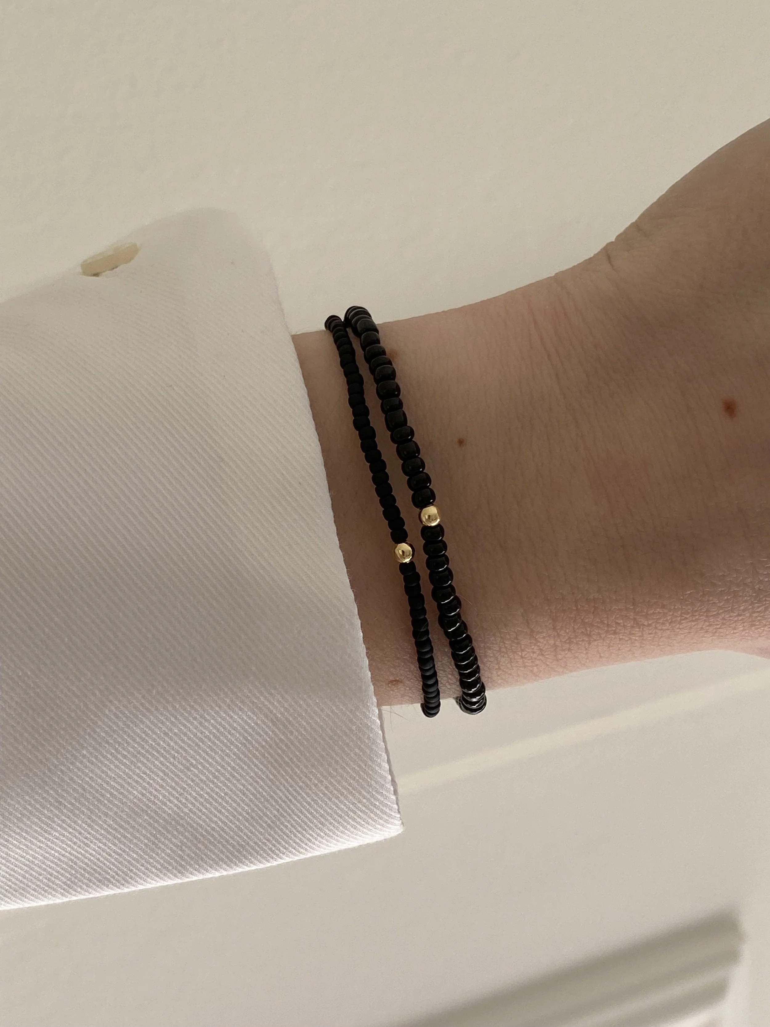 JOYEM All Black Subtle & Bold Worn.jpg