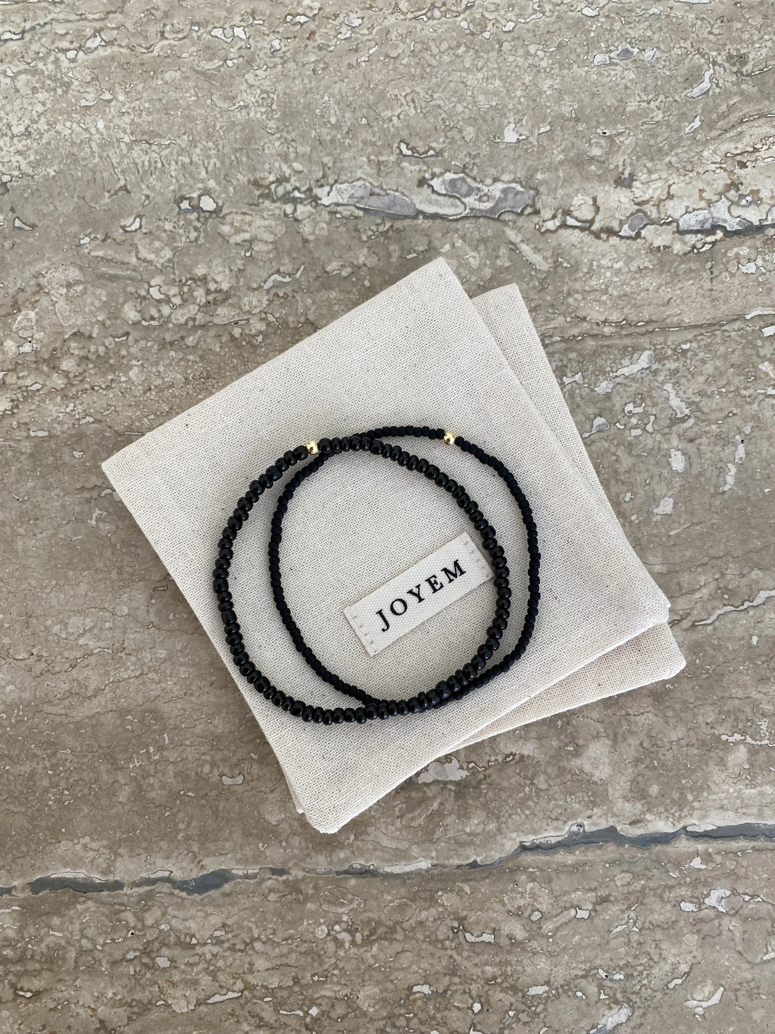 JOYEM All Black Subtle & Bold Stone.jpg