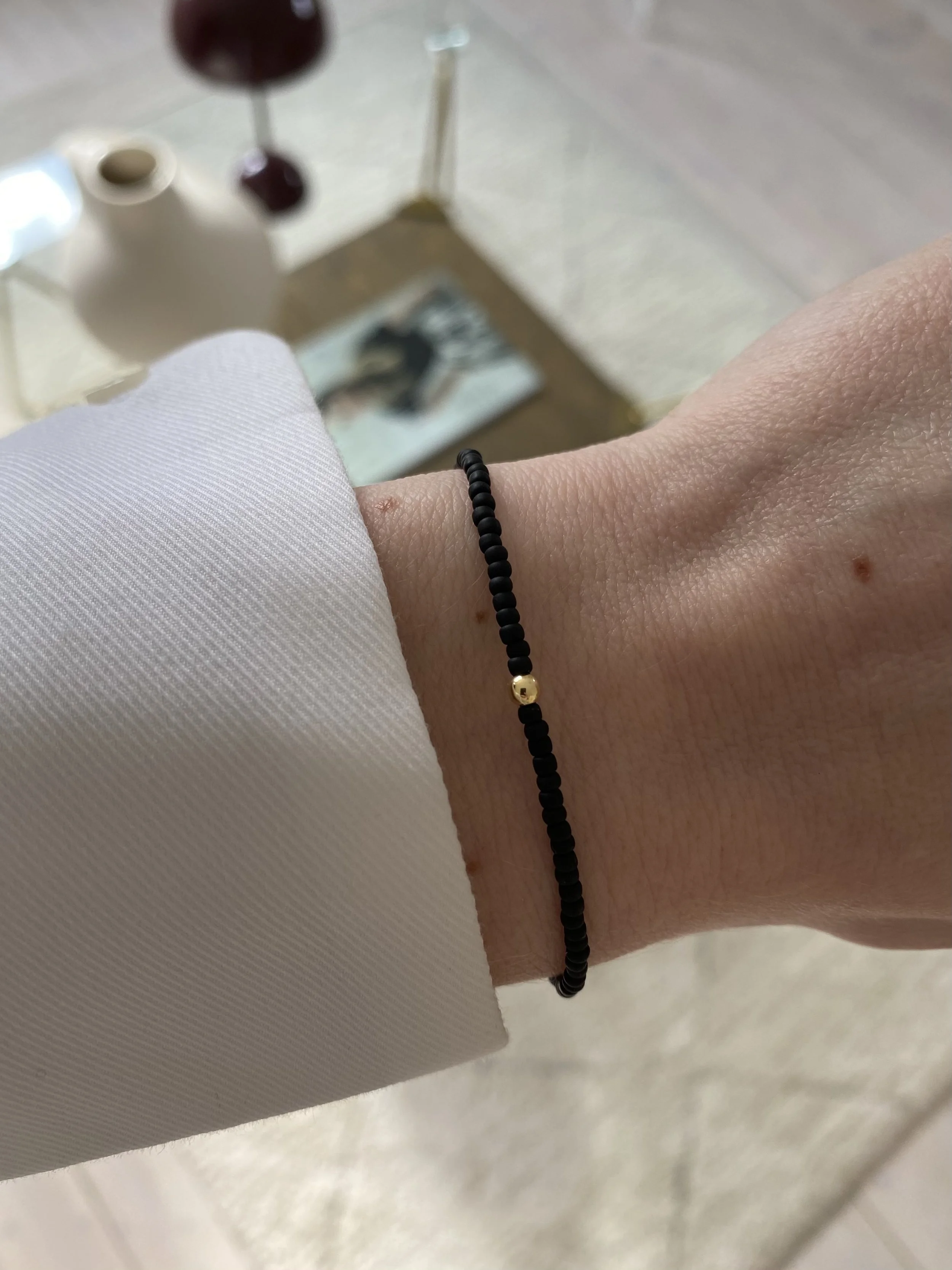 JOYEM All Black Subtle Worn.jpg