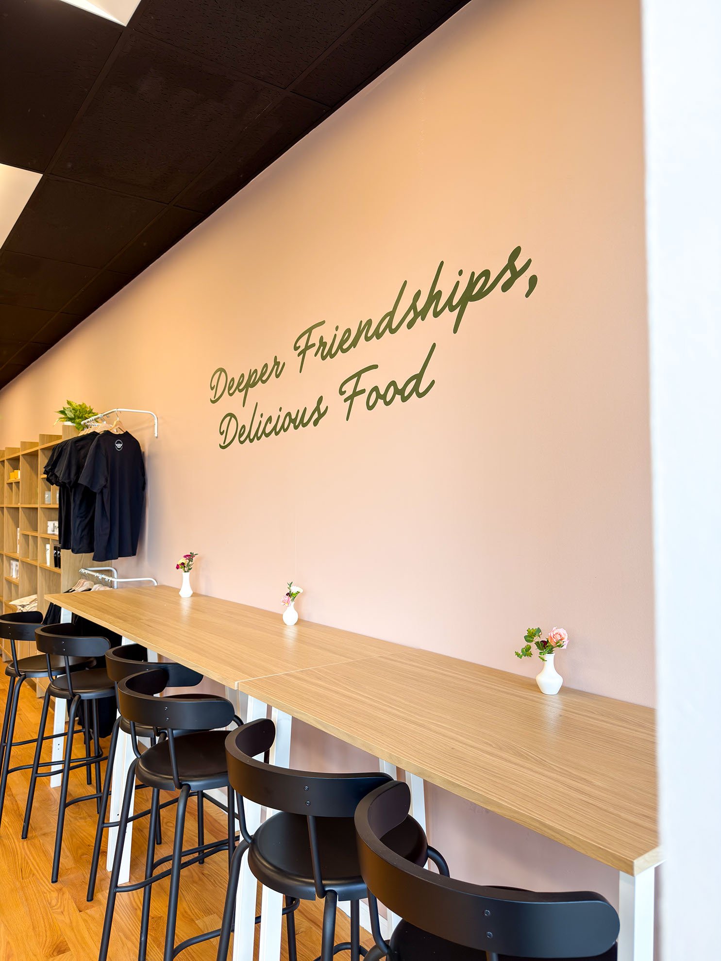 Signpainting on interior wall of small business
