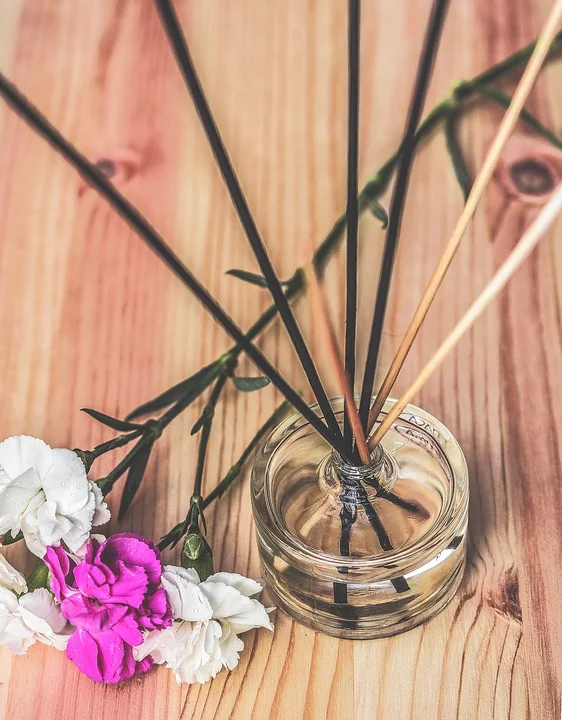 Diffusing essential oils with a reed.