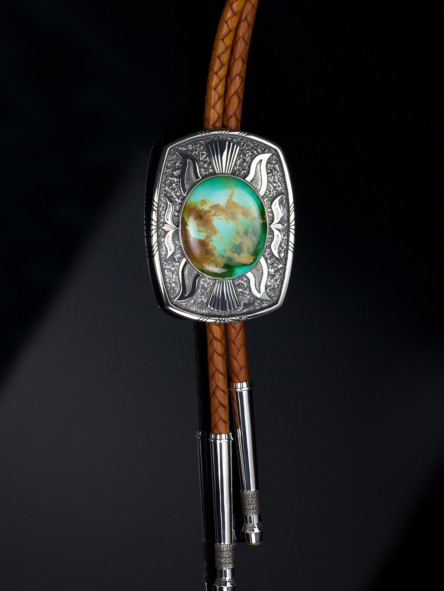 Bo Joe, turquoise master, presents &ldquo;Naabaahii,&rdquo; an exquisite sterling silver tufa cast bolo tie featuring 135 carats of vintage Royston turquoise, including the bolo tips. Just in time for Father&rsquo;s Day, this piece features artwork i