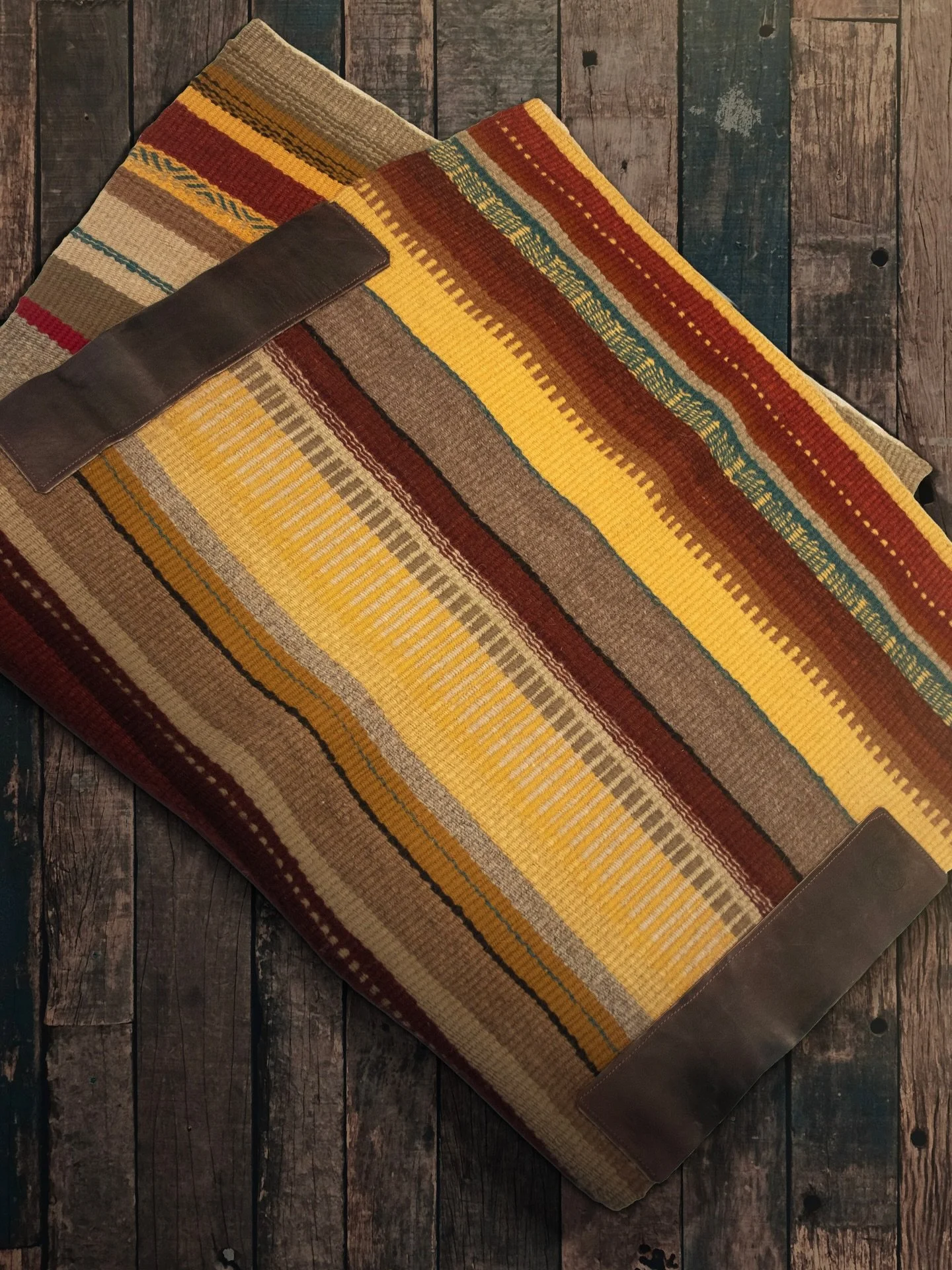 Linda Hayden&rsquo;s saddle blankets are masterfully crafted from start to finish. Made from the finest Churro wool, she spins, naturally dyes and weaves these utilitarian works of art. Perfect as a wall hanging or for your equestrian companion, thes