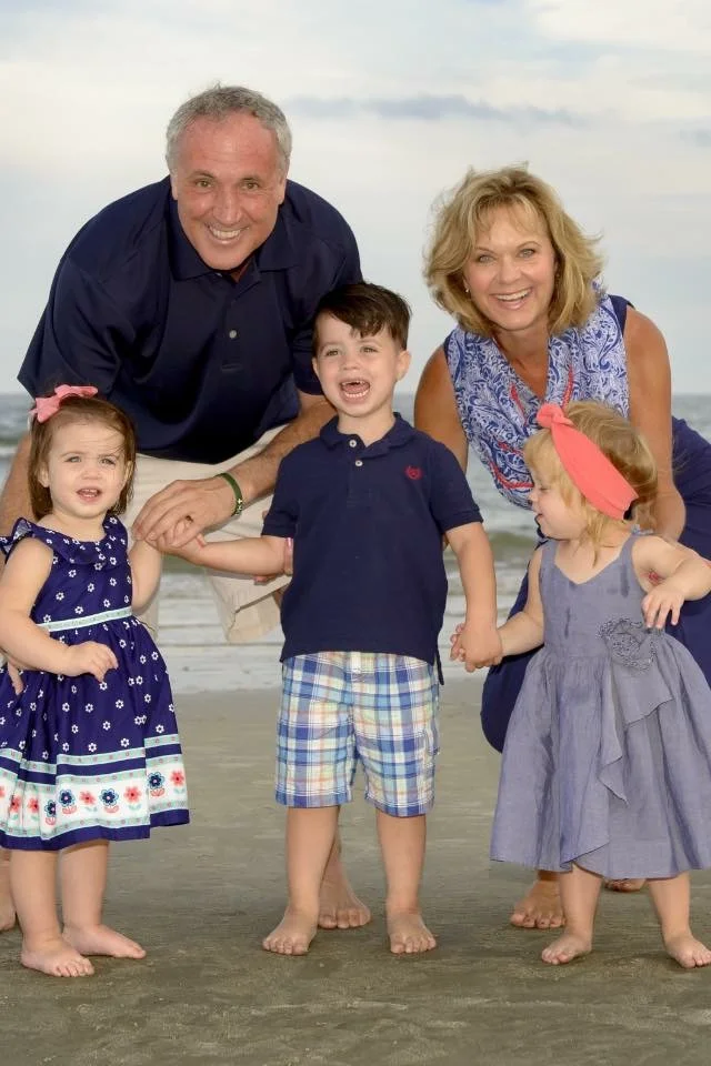 Terry, his wife pam and their grandchildren.