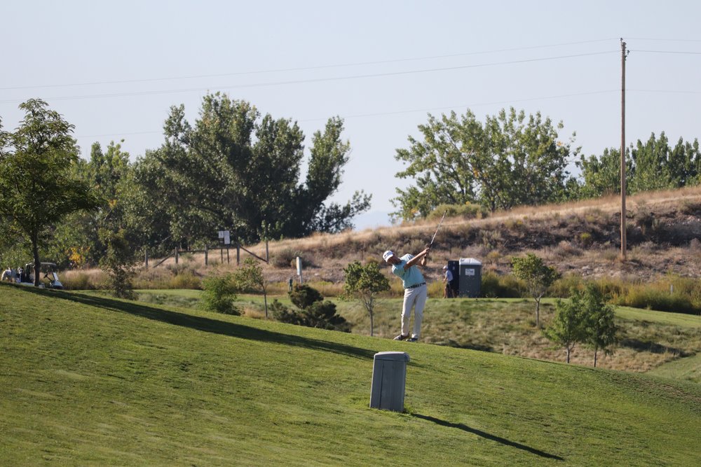 Burke Spensky hitting approach on hole No. 2.