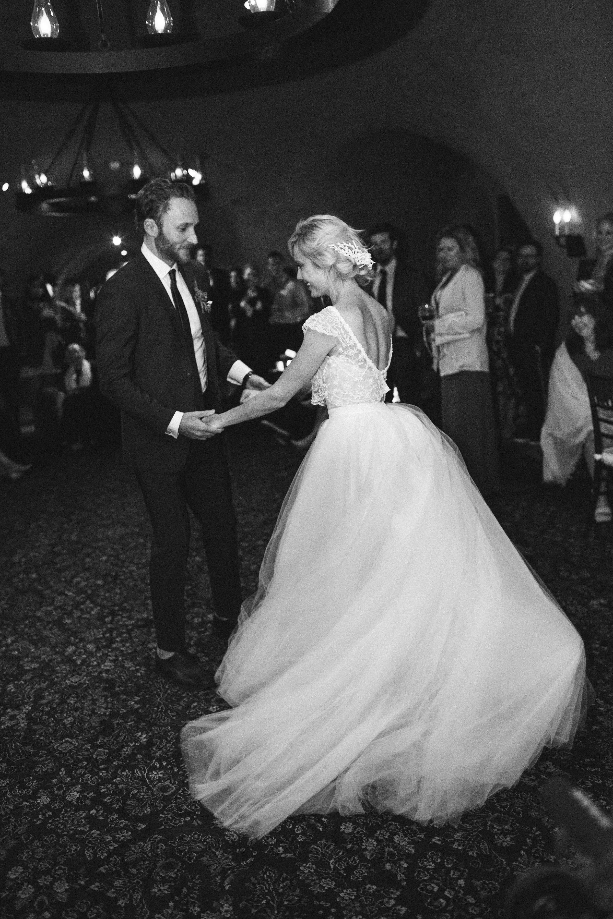 bride and groom first dance, Napa wedding, black and white wedding, two piece wedding dress || Orange Blossom Special Events